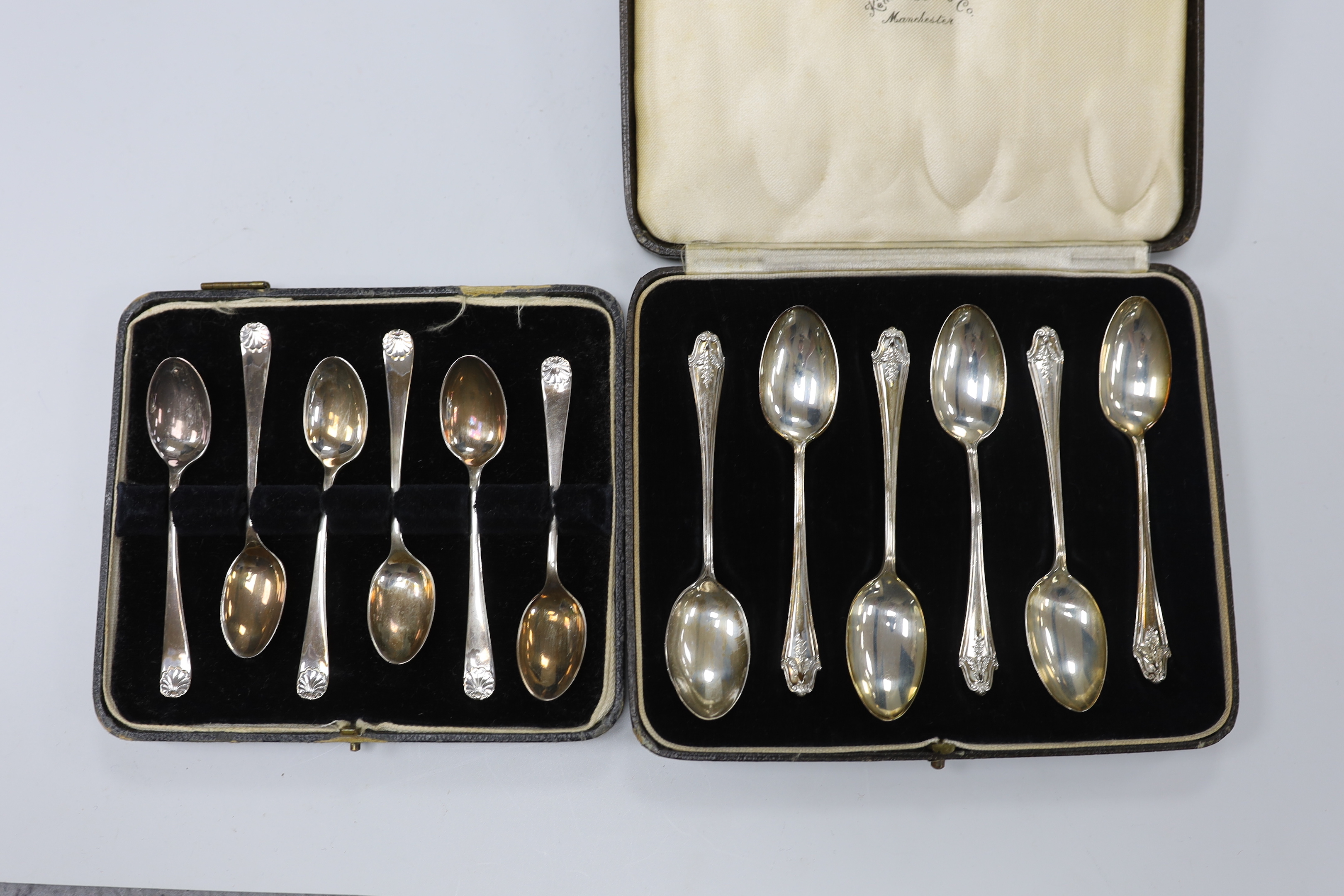 A mixed collection of silver items to include a George V teapot by Viners Ltd, a hot water pot, Victorian cream jug. christening mug, napkin rings and cased sets of teaspoons and pastry forks.